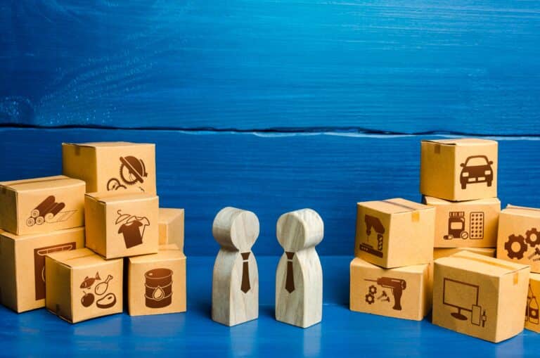 Home 1 Two chess pieces facing each other, symbolizing negotiation strategy in how to sell your business